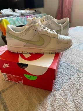 Nike Low-Top Sneakers in Cream with Pale Green Swoosh